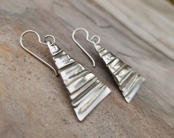 Rumpled silver medium triangular earrings