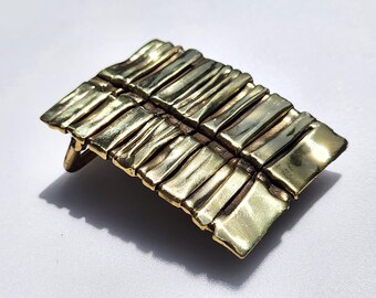 Spine foldformed belt buckle - solid brass