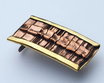 Spine inset belt buckle - foldformed copper and brass
