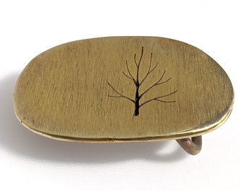 Oval Tree hand sawn belt buckle - solid brass