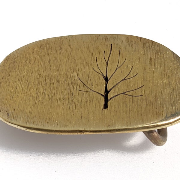 Oval Tree hand sawn belt buckle - solid brass