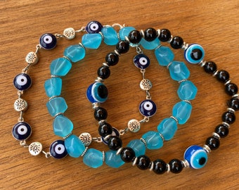 SALE- 1/2 off. Bracelet Trio- Evil Eye, Black Agate, and Blue Quartz Beaded Bracelets