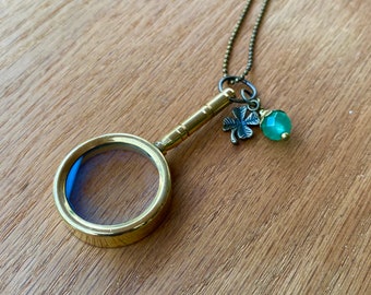 Brass Magnifying Glass Necklace with Faceted Chalcedony and Brass Four Leaf Clover