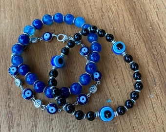 SALE- 1/2 off. Bracelet Trio- Evil Eye, Black Agate, and Blue Crackle Agate Beaded Bracelets
