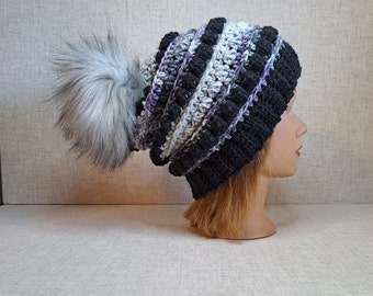 Ladies Crochet Beanie hat in charcoal, Purple, and greys  with a Detachable Pom Pom