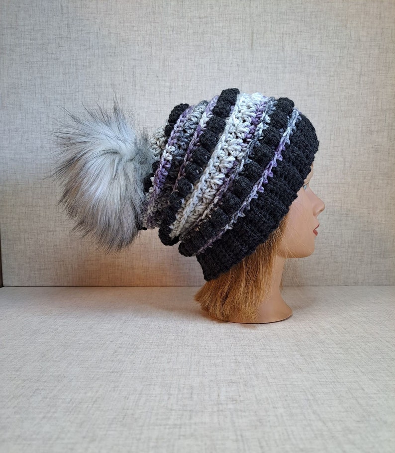 Ladies Crochet Beanie hat in charcoal, Purple, and greys with a Detachable Pom Pom image 1