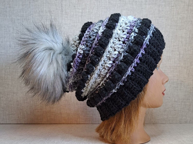 Ladies Crochet Beanie hat in charcoal, Purple, and greys with a Detachable Pom Pom image 6