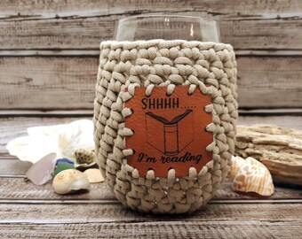 Crochet Stemless Wine Glass Cozy in cream with Shhhhh I'm Reading Vegan Leather Patch