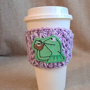 Crochet Coffee Sleeve Cozy in light purple  with a glittery frog drinking tea  Patch