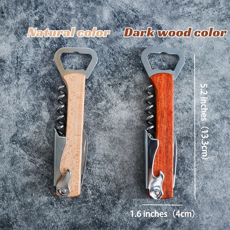 May include: Two waiter's corkscrews with metal bottle openers and foil cutters. One has a natural light wood handle, the other a dark wood handle. Text labels indicate natural and dark wood colors. Dimensions are 5.2 inches by 1.6 inches.