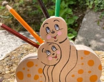 Wooden pencil holder with snail design