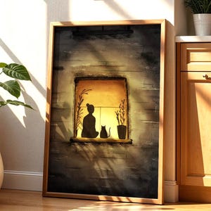 Peut inclure: Une impression d'art encadrée représentant un mur de briques gris foncé texturé avec une fenêtre centrale. À l'intérieur, une lumière jaune chaude éclaire les silhouettes d'une personne en position de méditation et d'un chat, entourés de deux plantes.