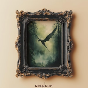 May include: A framed print depicting a black dragon soaring through a misty green forest. The frame is ornate, with a dark wood finish and gold accents.