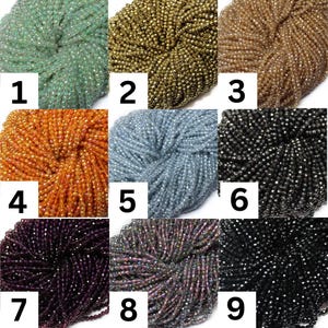 May include: Nine different colors of glass seed beads, each color is shown in a separate square. The beads are arranged in a circular pattern, with the center of the circle being the most visible part of the bead. The colors are: light blue, gold, brown, orange, light blue, black, purple, iridescent, and black.