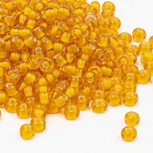 25g Preciosa 6/0 Czech Seed Beads Yellow Hyacinth Color Lined Chalkwhite (85066)