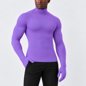 May include: A vibrant purple long-sleeve mock neck top featuring integrated gloves that cover the hands. The garment is form-fitting and constructed from a solid-colored, smooth fabric, paired with simple black trousers.