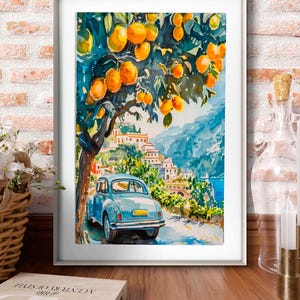 May include: Watercolor painting of a coastal scene with a blue car parked on a road. The artwork features a tree laden with oranges, a village, and a body of water. The painting is framed in a white border.