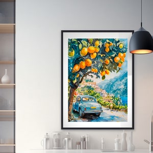 May include: Watercolor painting of a coastal scene with a blue car parked on a road. The artwork features a tree laden with oranges, a village, and a view of the sea. The painting is framed in a black frame.