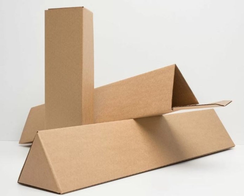 May include: Three brown cardboard boxes, one tall and rectangular, and two long and triangular.