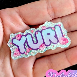 Yuri Glitter Acrylic Pin
