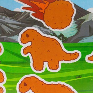 May include: A set of colorful stickers featuring cartoon dinosaurs and a meteor, all shaped like fried chicken. The stickers are on a green and brown background.