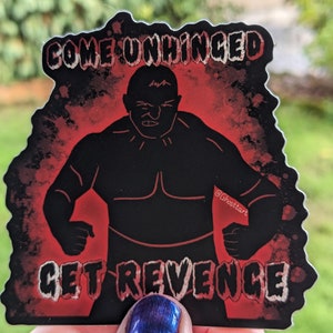 May include: Black sticker with a red and black design. The sticker features a muscular figure with the words "COME UNHINGED" and "GET REVENGE" in white text. The background has a red, splattered effect.