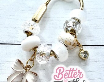 White Beaded Keychain w/ Gold Bow Charm | Personalized Initial Bag Charm | Purse Accessory | Carabiner Charm | Gold Bag Accessory