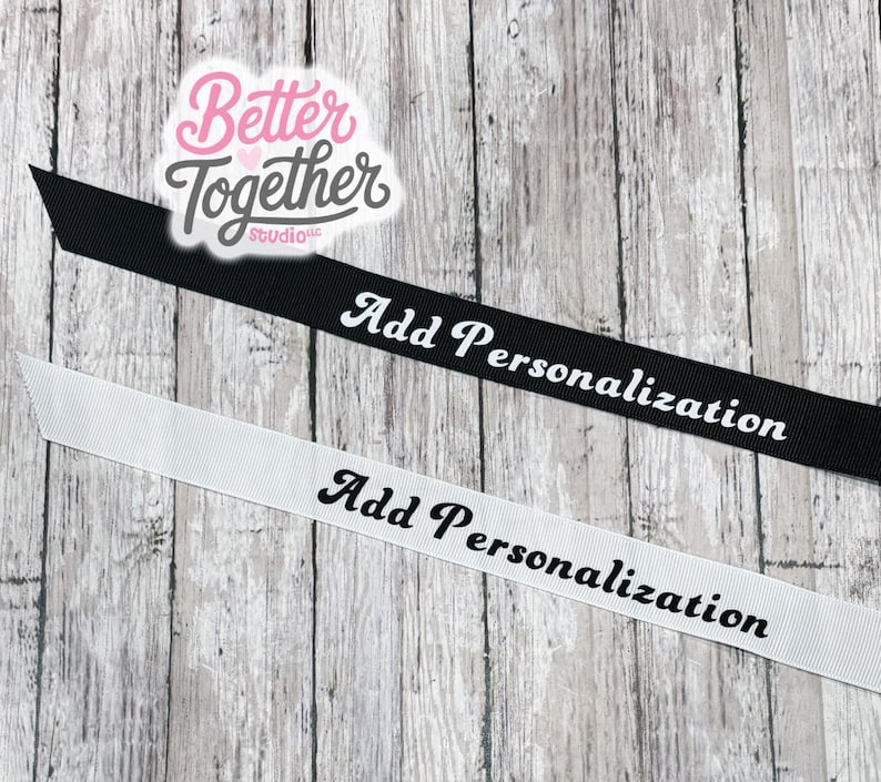 May include: Two strips of grosgrain ribbon, one black with white text and one white with black text, both featuring the phrase Add Personalization in a cursive font. A logo for Better Together Studio is positioned above the ribbons.