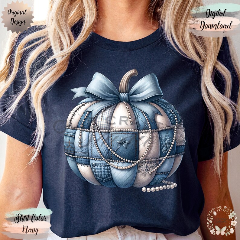 May include: Navy blue t-shirt with a pumpkin design. The pumpkin is decorated with a light blue bow, patchwork patterns, and pearl accents. The words "Original Design" and "Digital Download" are visible.