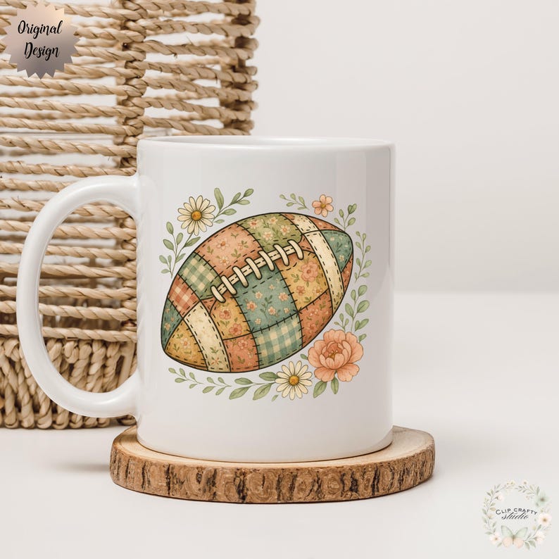 May include: White ceramic mug featuring a colorful patchwork football design surrounded by floral accents. The mug has a curved handle and sits on a wooden coaster. The words "Original Design" are in the upper left corner.