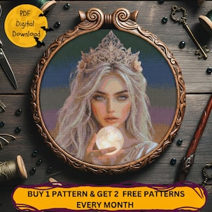 May include: A cross-stitch pattern of a woman with long, flowing blonde hair, wearing a crown and holding a glowing orb. The artwork is framed in a decorative, ornate wooden hoop. The image includes text that says "PDF Digital Download" and "Buy 1 Pattern & Get 2 Free Patterns Every Month."