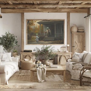 May include: A living room with a white couch, a wooden coffee table, and a framed painting of a woman and a child in front of a house. The room has a rustic feel with wooden beams on the ceiling and a large window with a view of trees.