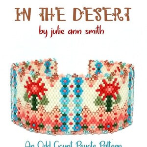 May include: A beaded bracelet with a colorful floral pattern, titled "In The Desert" by Julie Ann Smith. The bracelet is made with an odd count peyote stitch.