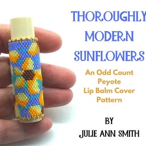 May include: A beaded lip balm cover featuring a modern sunflower design in shades of yellow, orange, blue, and brown. The cover is made using peyote stitch and is an odd count pattern. The title "Thoroughly Modern Sunflowers" is displayed above the image. The text "An Odd Count Peyote Lip Balm Cover Pattern" is displayed below the image. The text "By Julie Ann Smith" is displayed at the bottom of the image.