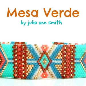 May include: A turquoise, red, white and gold beaded bracelet with a geometric pattern. The bracelet is titled "Mesa Verde" by "julie ann Smith".