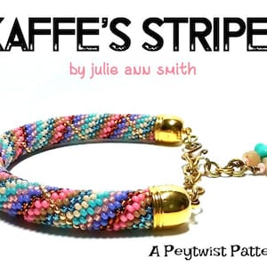 May include: A colorful beaded bracelet with a gold clasp and a charm. The bracelet is made with a peytwist pattern and has a pink, blue, brown, and gold color scheme. The bracelet is labeled "Kaffee's Stripes by Julie Ann Smith".
