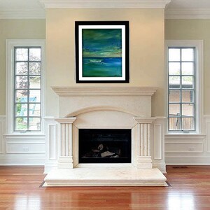 May include: A framed abstract painting with shades of blue, green, and white hangs above a white marble fireplace in a room with hardwood floors and two windows.