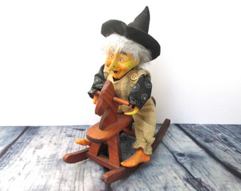halloween doll on rocking horse
