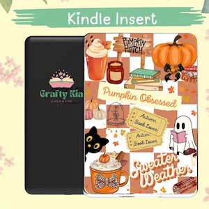 May include: A black Kindle Insert case with a fall-themed design. The design includes a pumpkin, coffee, books, and the text "Pumpkin Obsessed" and "Sweater Weather". The case also features a black cat and the text "Crafty Kia Handmade".