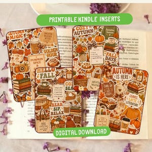 May include: Three rectangular printable Kindle inserts featuring autumn-themed illustrations including pumpkins, stacks of books, sweaters, coffee cups, and foliage. The designs contain text such as Autumn Magic, Cozy Autumn, and Autumn Is Here, with warm orange, brown, and cream color palettes.