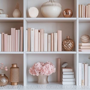 May include: A white bookshelf with multiple shelves filled with books, decorative vases, and flowers. The books are mostly white and pink with some brown accents. The vases are gold and silver with a variety of shapes and sizes. The flowers are pink and white and are arranged in a vase on the bottom shelf.