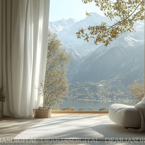 May include: A white armchair with a throw blanket sits in front of a large window with a view of a lake and mountains. The room has white curtains and a bookshelf filled with books.