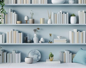 May include: A white bookshelf with three shelves filled with books, vases, and decorative objects. The shelves are against a light blue wall.