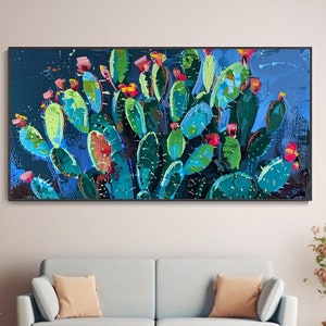 以下が含まれることがあります： 緑の葉とピンクの花が咲いたサボテンの絵。サボテンは、太い筆致で、鮮やかで抽象的なスタイルで描かれています。