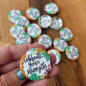 celebrate your strength buttons with pin back set of 25 survivor, living with cancer pin, mindfulness pins, mantra pin, ministry ideas image 1