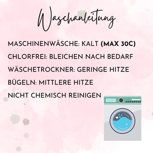 May include: A pink and white watercolor background with a black and white illustration of a washing machine. The text "Waschanleitung" is at the top of the image. The text below the illustration reads: "MASCHINENW&Auml;SCHE: KALT (MAX 30C) CHLORFREI: BLEICHEN NACH BEDARF W&Auml;SCHETROCKNER: GERINGE HITZE B&Uuml;GELN: MITTLERE HITZE NICHT CHEMISCH REINIGEN"