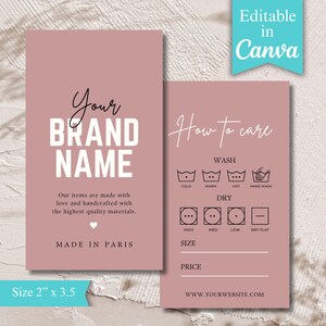 Peut inclure: Deux étiquettes de produit rectangulaires, de couleur rose poussiéreux. L'étiquette de gauche affiche le texte "Your BRAND NAME" en blanc, avec du texte supplémentaire en dessous. L'étiquette de droite affiche "How to care" et des symboles d'entretien. La taille est de 5,08 cm x 8,89 cm.