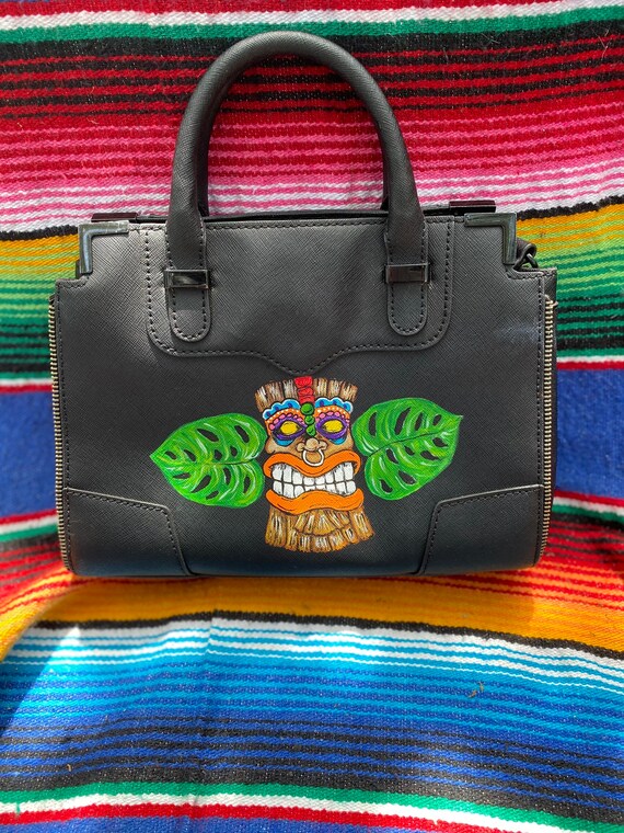 Gorgeous like new designer Rebecca Minkoff black leather purse handbag with hand painted Tiki