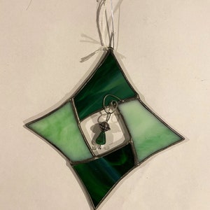 Stained glass Christmas ornament swirl