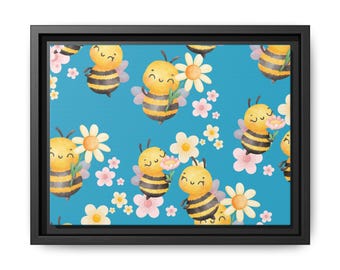 May include: A framed canvas print with a repeating pattern of cartoon bees and flowers on a blue background. The bees are yellow and black, and the flowers are white and pink. The canvas is framed in black.